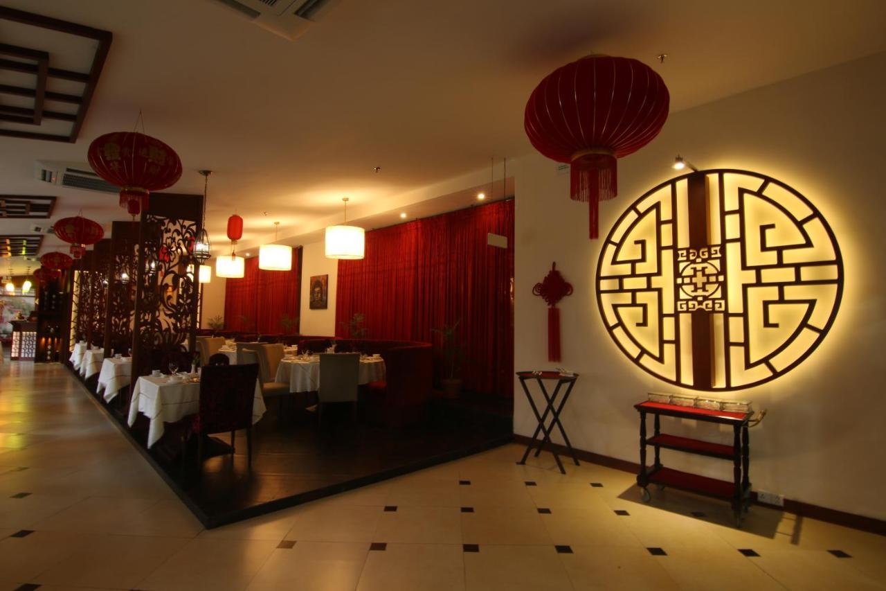 Ramada Plaza By Wyndham Karachi Airport Hotel Екстериор снимка Interior of a restaurant in Beijing